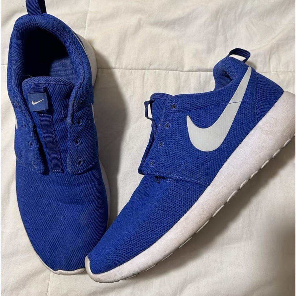 Nike blue shoes, need shoe laces! 👟